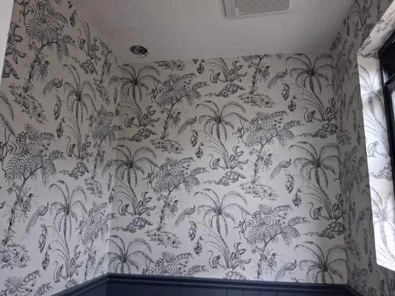 Residential wallpaper installation in a Denver living room